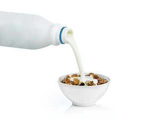 Image showing Healthy Breakfast-Cornflakes and Milk Splash.Isolated on white