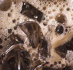 Image showing cola with ice cubes close up