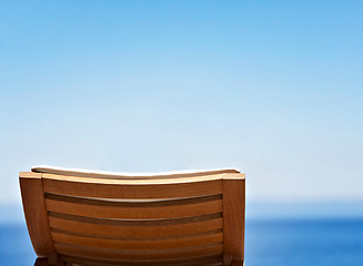 Image showing Beautiful beach with chaise lounge