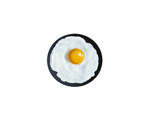 Image showing Fried Egg in a frying pan isolated on white, top view