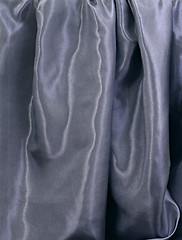 Image showing Smooth elegant black satin background.