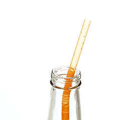 Image showing a straw in a bottle isolated on white background