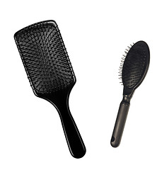 Image showing two hairbrushes , comb on bright background