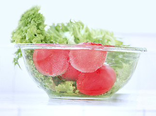 Image showing fresh tomatoes with pouring water