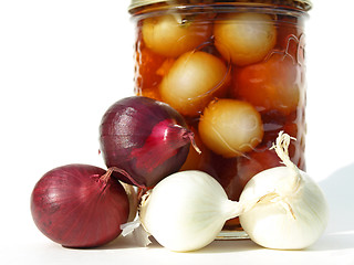 Image showing White and red onions with jar