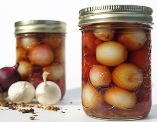 Image showing Two jars of pickled onions