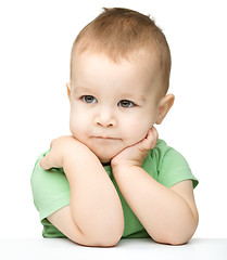 Image showing Portrait of a cute and pensive little boy