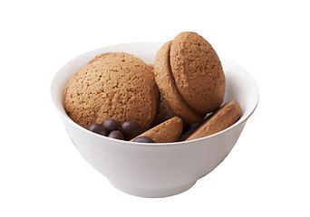 Image showing oatmeal cookies and chocolate candy