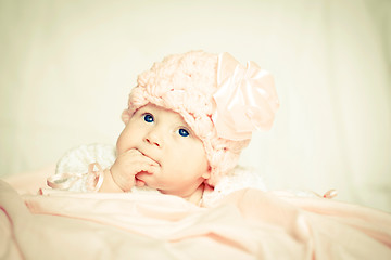 Image showing baby girl in a pink hat