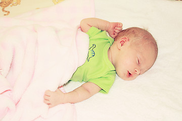 Image showing Baby sleeping in bed