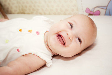 Image showing the portrait of little girl in her bed