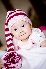 Image showing cute baby in a hat with pompom