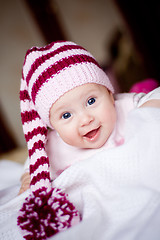 Image showing cute baby in a hat with pompom