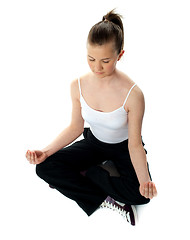 Image showing Aerial view of meditating girl