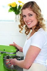 Image showing Pretty female chef at work