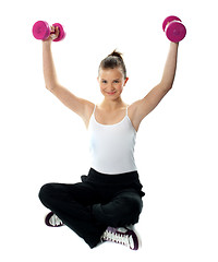 Image showing Fit girl with dumbbells in sportswear