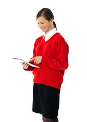 Image showing Beautiful teenage using electronic tablet