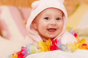 Image showing smiling baby girl in pink