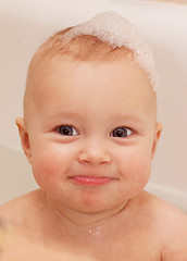 Image showing Adorable bath baby with soap suds