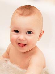 Image showing Adorable bath baby with soap suds