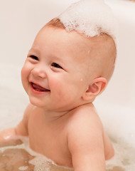 Image showing Adorable bath baby with soap suds