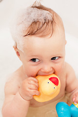 Image showing Adorable bath baby with soap suds