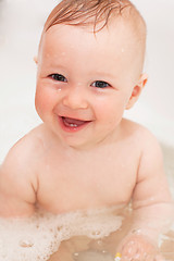 Image showing Adorable bath baby with soap suds