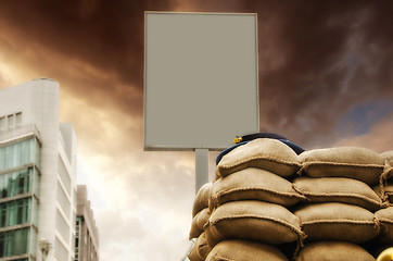 Image showing Checkpoint with blank Signboard and Sandbags