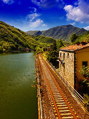 Image showing Railway with River, Sky and Vegetation in Tuscany