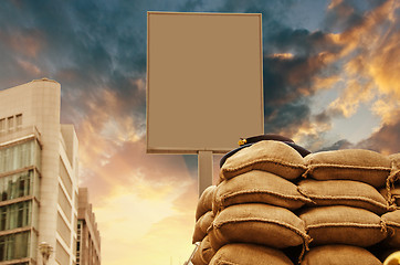 Image showing Checkpoint with blank Signboard and Sandbags