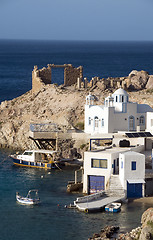 Image showing houses built into rock cliffs on Mediterranean Sea Firopotamos M