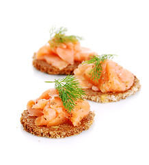 Image showing delicious appetizers with salmon 