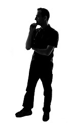 Image showing Silhouette of a young man thinking