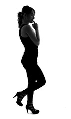 Image showing stylish silhouette of caucasian woman posin