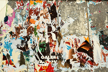 Image showing grunge background with old torn posters 