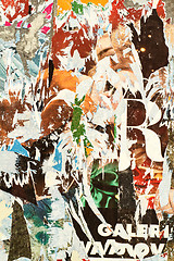 Image showing grunge background with old torn posters 