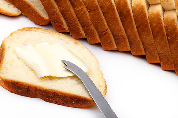 Image showing Slices of Wheat Bread with Butter