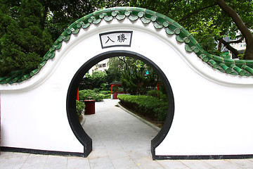 Image showing Chinese door in garden