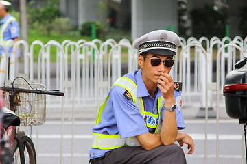 Image showing Guangzhou policeman on street, China