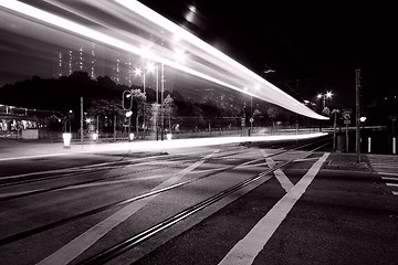 Image showing Traffic through downtown of Hong Kong at night in black and whit