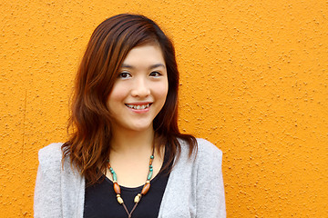 Image showing Beautiful and young asian woman smiling