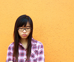 Image showing A sad asian woman