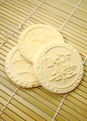 Image showing Rice biscuits on bamboo plate