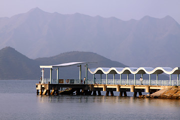 Image showing Dock to pier under blue sky in Hong Kong