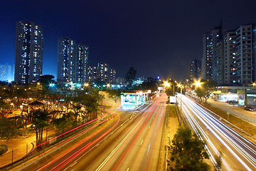 Image showing Modern city and traffic at night