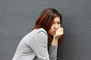 Image showing Asian woman with frightened face