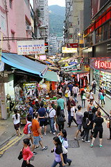 Image showing An old street with moving people in Hong Kong