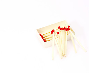 Image showing Red matches isolated on white background