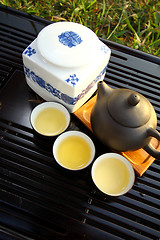 Image showing Chinese tea set under sunlight