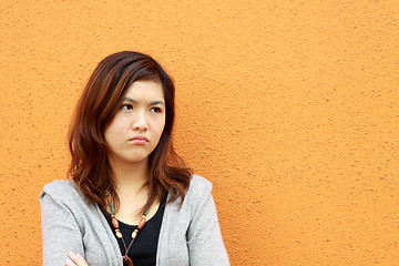 Image showing A sad asian woman